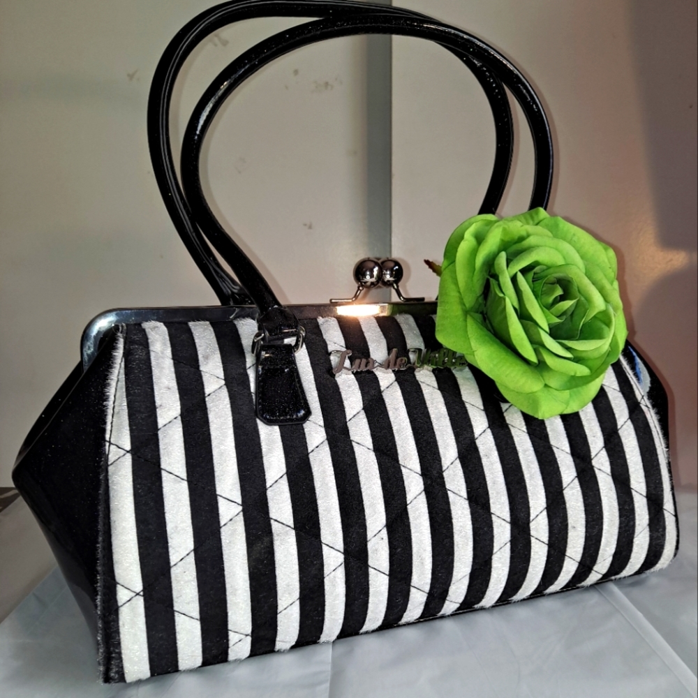Lux De Ville black and white striped purse handbag. Green rise brooch
